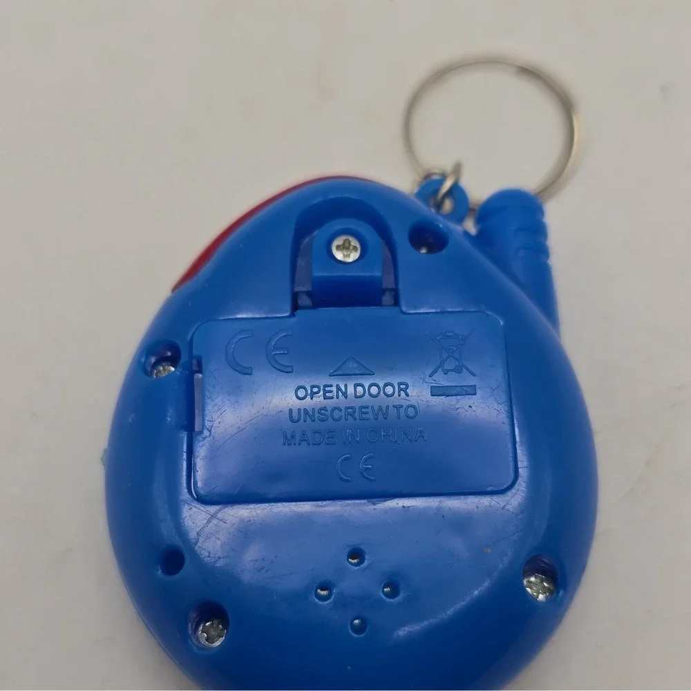Blue Virtual Pet Electronic Keychain Toy Handheld Game, Tamagotchi UNTESTED